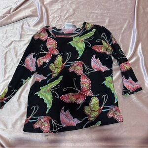 beaded Adorable vintage butterfly print long sleeve top with a black background